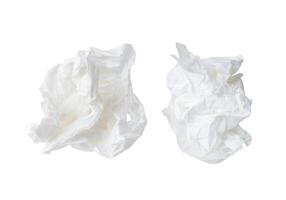 Top view set of screwed or crumpled tissue paper balls after use in toilet or restroom isolated on white background with clipping path photo