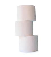 Side view of tissue paper rolls in stack isolated on white background with clipping path photo