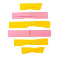 Top view set of wrinkled yellow and pink adhesive vinyl tape or cloth tape in stripes shape isolated on white background with clipping path photo