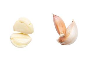 Top view set of peeled and unpeeled pounded garlic cloves in stack isolated on white background with clipping path photo