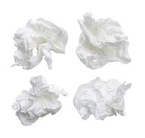 Top view set of screwed or crumpled tissue paper balls after use in toilet or restroom isolated on white background with clipping path photo