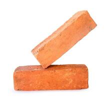 Side view of old cracked red or orange bricks in stack isolated on white background with clipping path photo