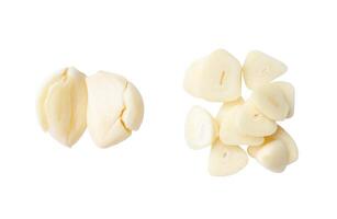 Top view set of fresh pounded garlic cloves and slices in stack isolated on white background with clipping path photo