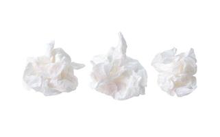 Front view set of screwed or crumpled tissue paper or toilet paper balls after use in toilet or restroom isolated on white background with clipping path photo