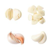 Top view set of fresh pounded garlic cloves and slices in stack isolated on white background with clipping path photo