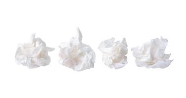 Front view set of screwed or crumpled tissue paper or toilet paper balls after use in toilet or restroom isolated on white background with clipping path photo