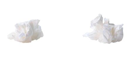 Front view set of screwed or crumpled tissue paper balls after use in toilet or restroom isolated on white background with clipping path photo