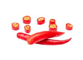 Top view set of red chili pepper or cayenne pepper with slices in stack isolated on white background with clipping path photo