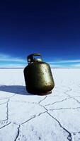 old rusted danger gas container on salt lake video