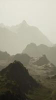 A misty mountain range in the fog video