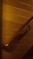 Close Up of Metal Hand Rail on Tiled Wall video