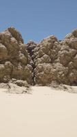 A group of rocks sitting in the middle of a desert video