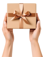 Female hand holding a brown gift box png