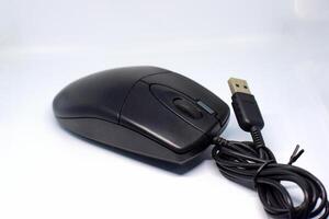 Black computer mouse isolated with white background photo