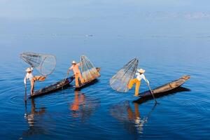 Burmese fishermen at Inle lake, Myanmar photo