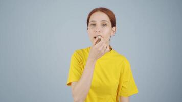 Woman applying lipstick. video