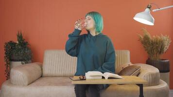 Young woman drinking water for healthy life. video