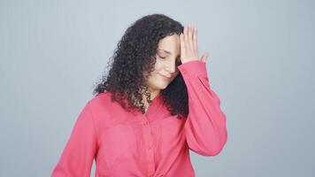 Young woman looking at camera with a negative expression. video