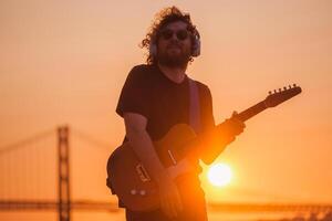 Street musician playing electric guitar in the street photo