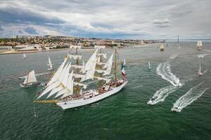 Tall ships sailing in Tagus river. Lisbon, Portugal photo