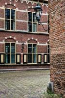 Street lamp in the Binnenhof complex in the Hague, the Netherlands photo