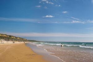 Atlantic ocean beach at Fonte da Telha beach, Costa da Caparica, Portugal photo