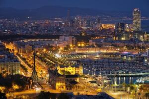 Aerial view of Barcelona city and port with yachts photo