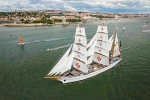 Tall ships sailing in Tagus river. Lisbon, Portugal photo