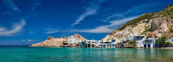 The beach of Firapotamos in Milos, Greece photo