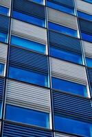 Modern building facade with widnows close up photo