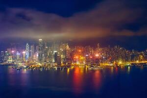 Aerial view of illuminated Hong Kong skyline. Hong Kong, China photo