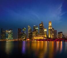Singapore skyline in evening photo