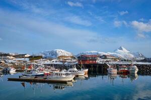 Fishing boats and yachts on pier in Norway photo