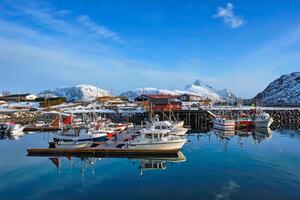 Fishing boats and yachts on pier in Norway photo