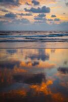 Sunset on Baga beach. Goa photo