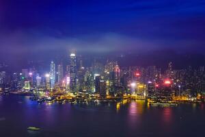 Aerial view of illuminated Hong Kong skyline. Hong Kong, China photo