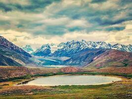 Small lake in Himalayas photo