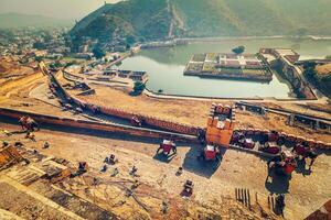 Tourists riding elephants on ascend to Amer fort photo