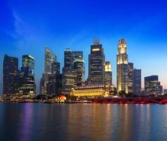 Singapore skyline and river in evening photo