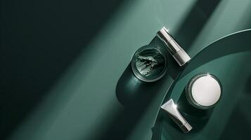 A dark green background with skincare products placed on it, surrounded by sunlight. photo