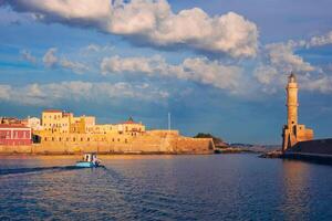 Boat in picturesque old port of Chania, Crete island. Greece photo