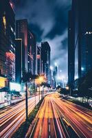 Street traffic in Hong Kong at night photo