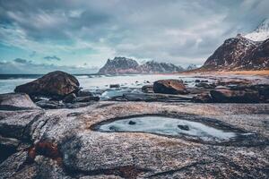 Beach of fjord in Norway photo