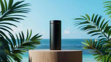 A matte black jar on an elegant wooden podium in front of the ocean with palm leaves. photo