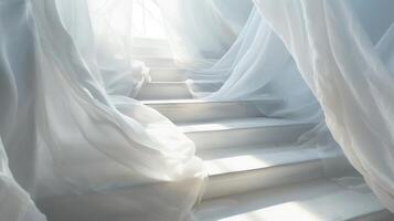 White linen fabric draped over a white staircase. photo