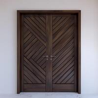 Dark brown wooden door with diagonal grooves on the surface with white wall in background. photo