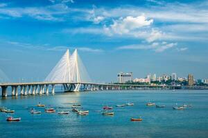 Bandra Worli Sea Link bridge with fishing boats view from Bandra fort. Mumbai, India photo