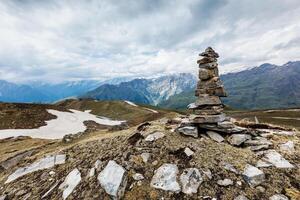 Stone cairn in Himalayas photo