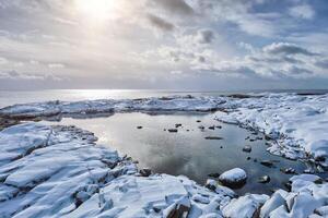 Sea sunset in winter photo