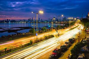 Marine drive in the night with car light trails. Mumbai, Maharashtra, India photo